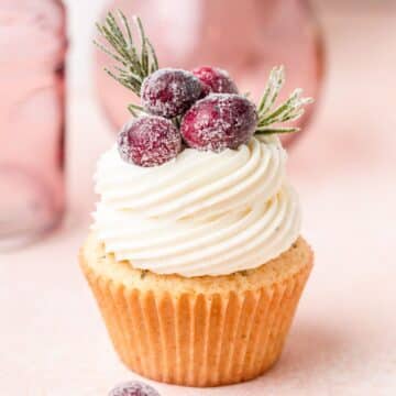 close up of cranberry cupcakes with white chocolate buttercream.