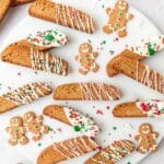 close up of gingerbread biscotti dipped in white chocolate.