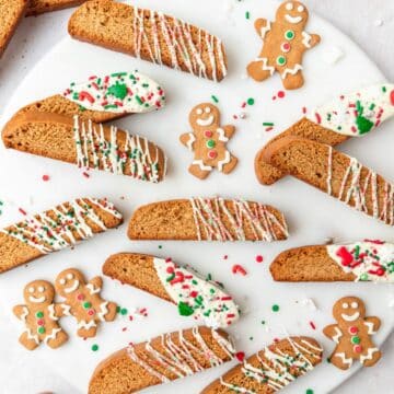 close up of gingerbread biscotti dipped in white chocolate.