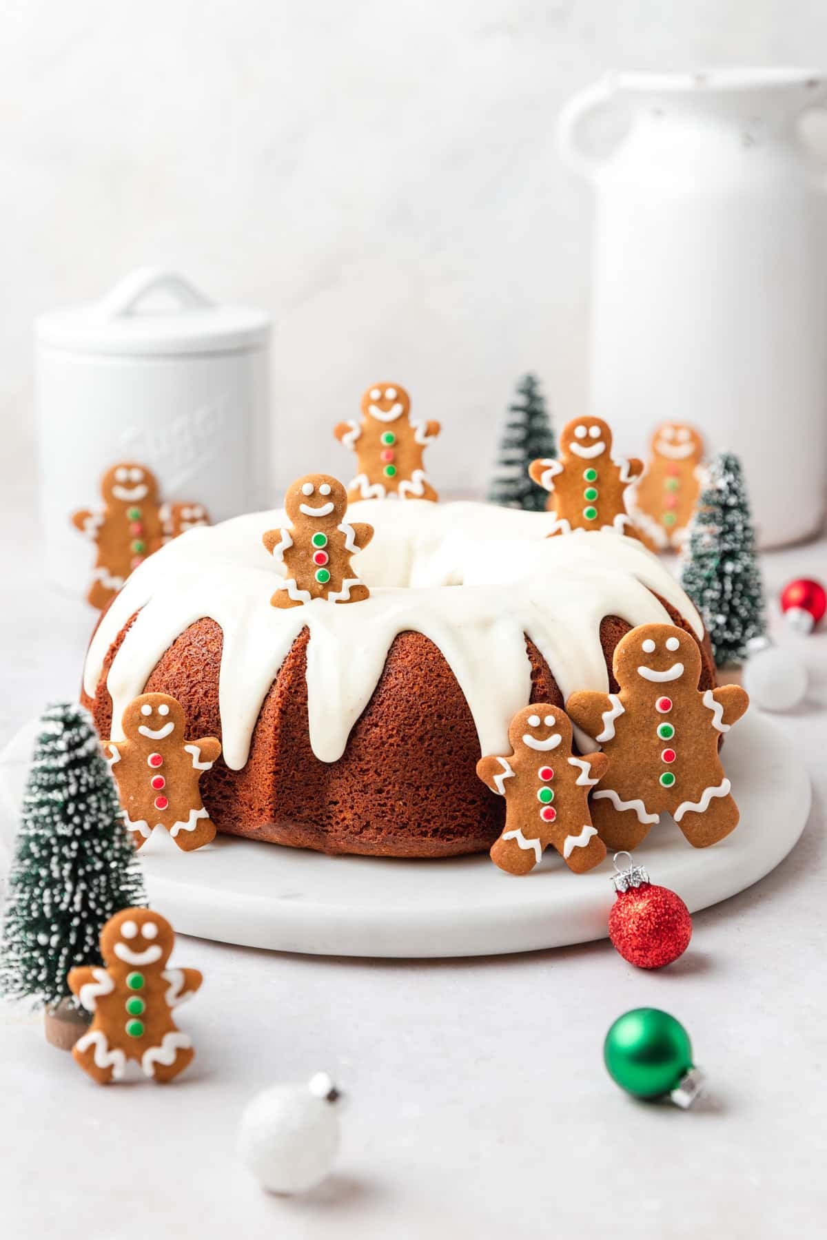 gingerbread bundt cake decorated with mini gingerbread cookies.