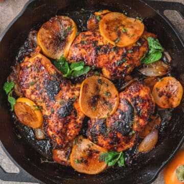 close up of roasted harissa and persimmon chicken.