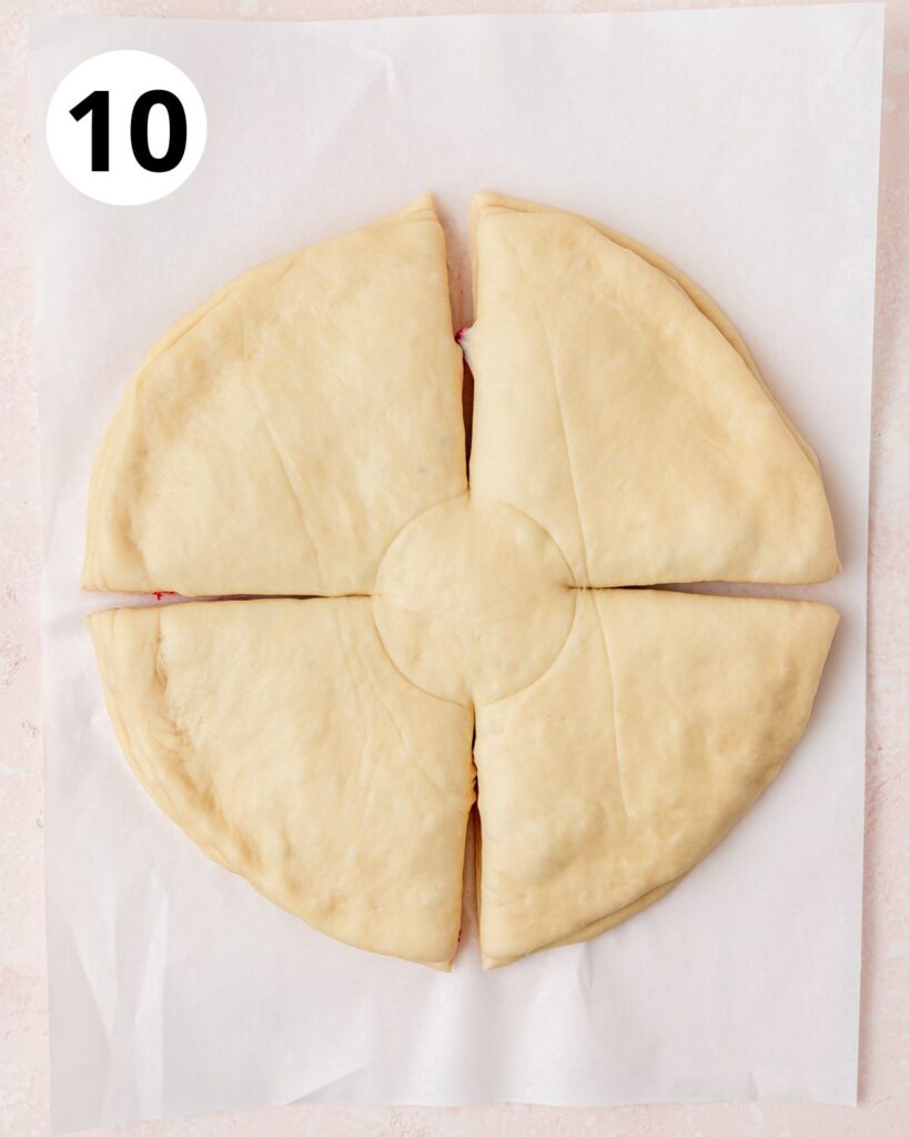 cutting dough into 4 sections.