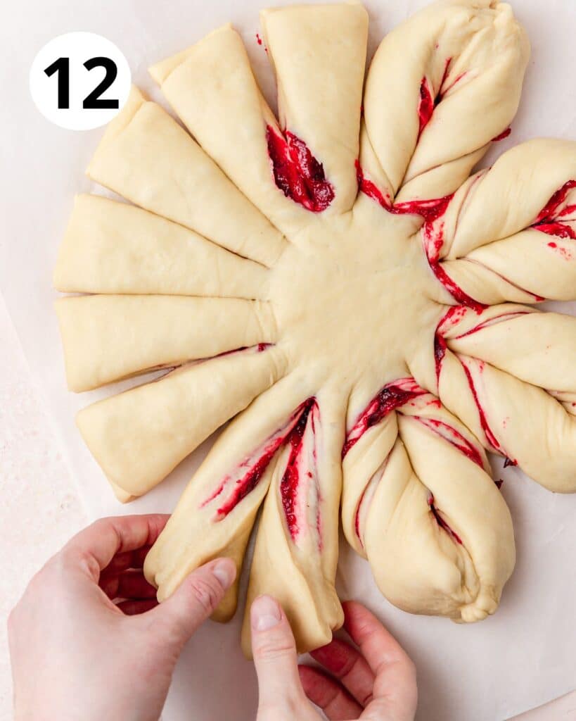 grabbing onto 2 sections of the bread.