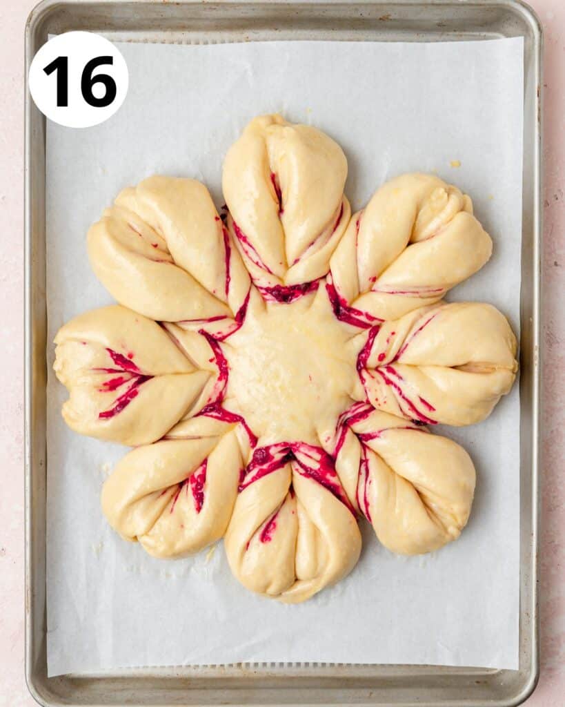 star bread brushed with egg wash before baking.