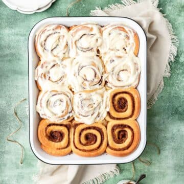 close up of tray of brown butter eggnog cinnamon rolls.