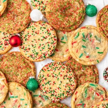 close up of christmas sugar cookies with sprinkles.