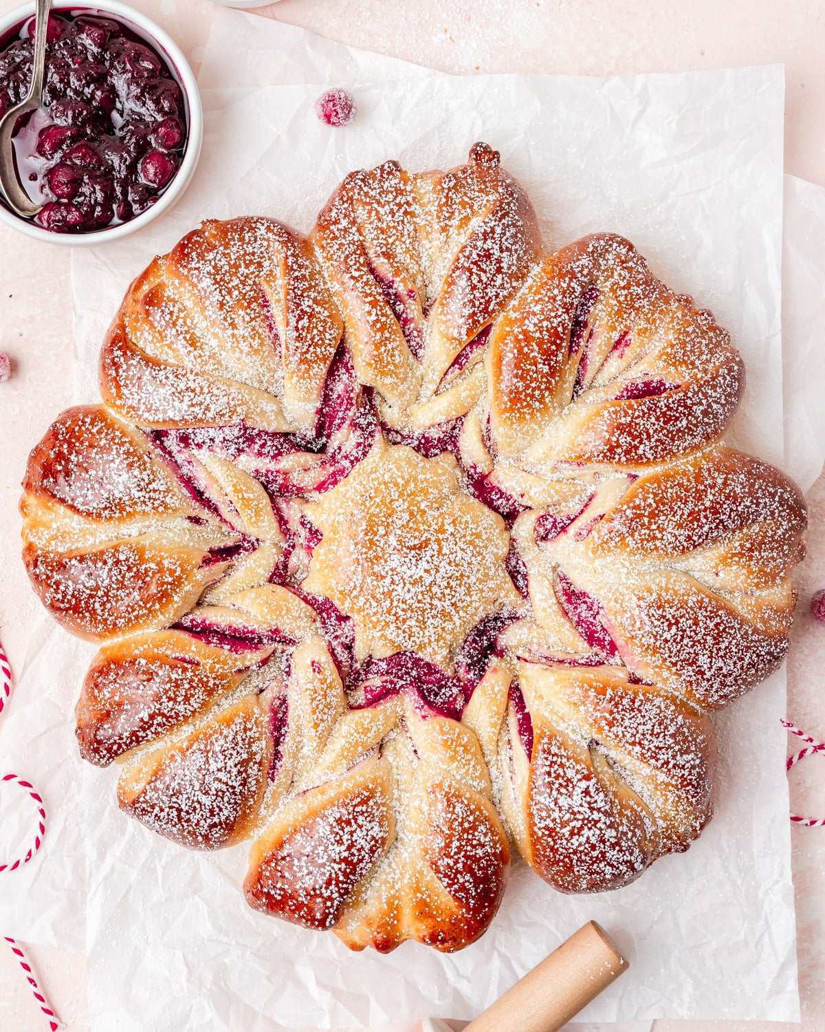 christmas star bread filled with cranberry sauce.
