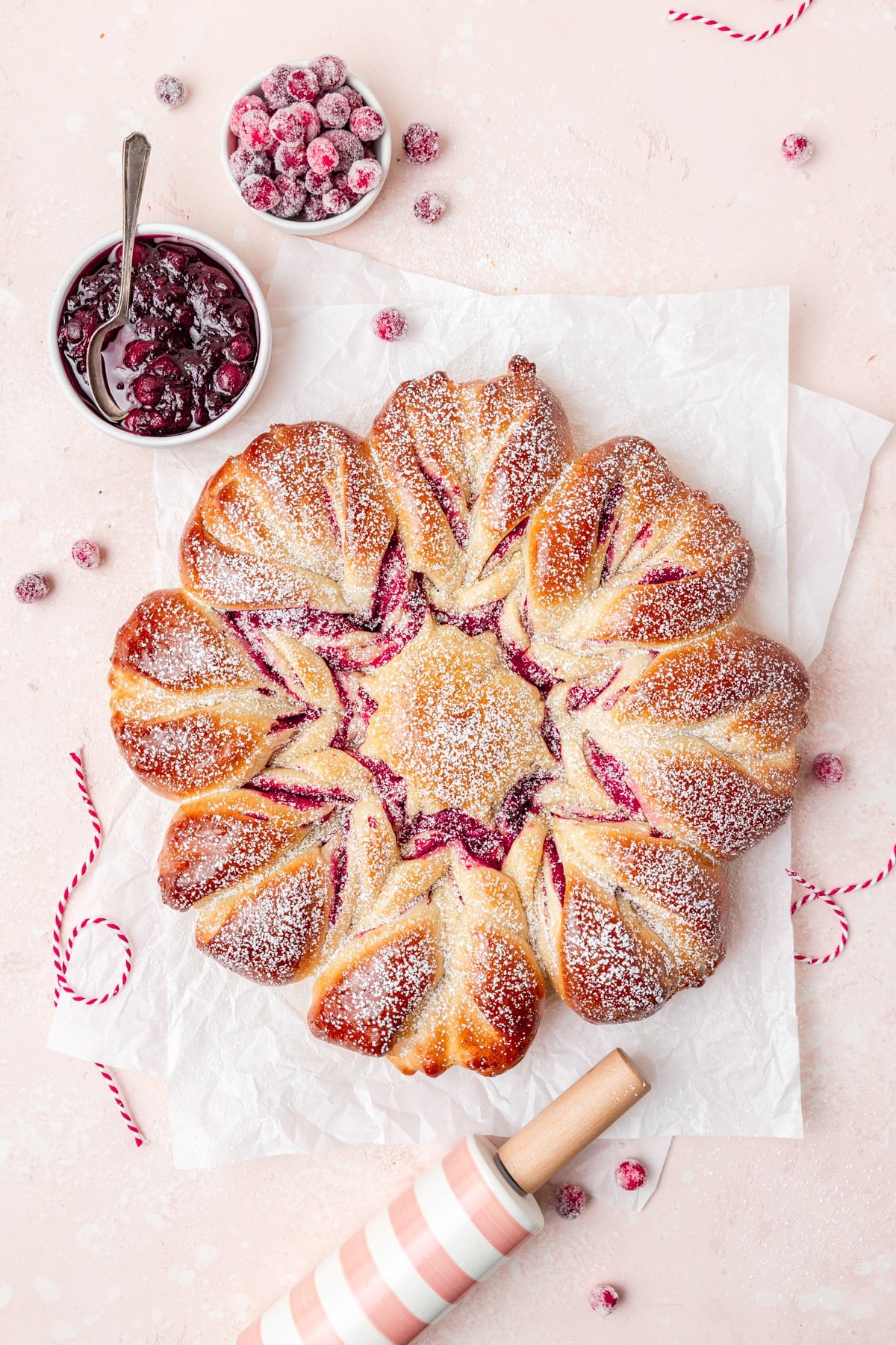 cranberry star bread dusted with powdered sugar.