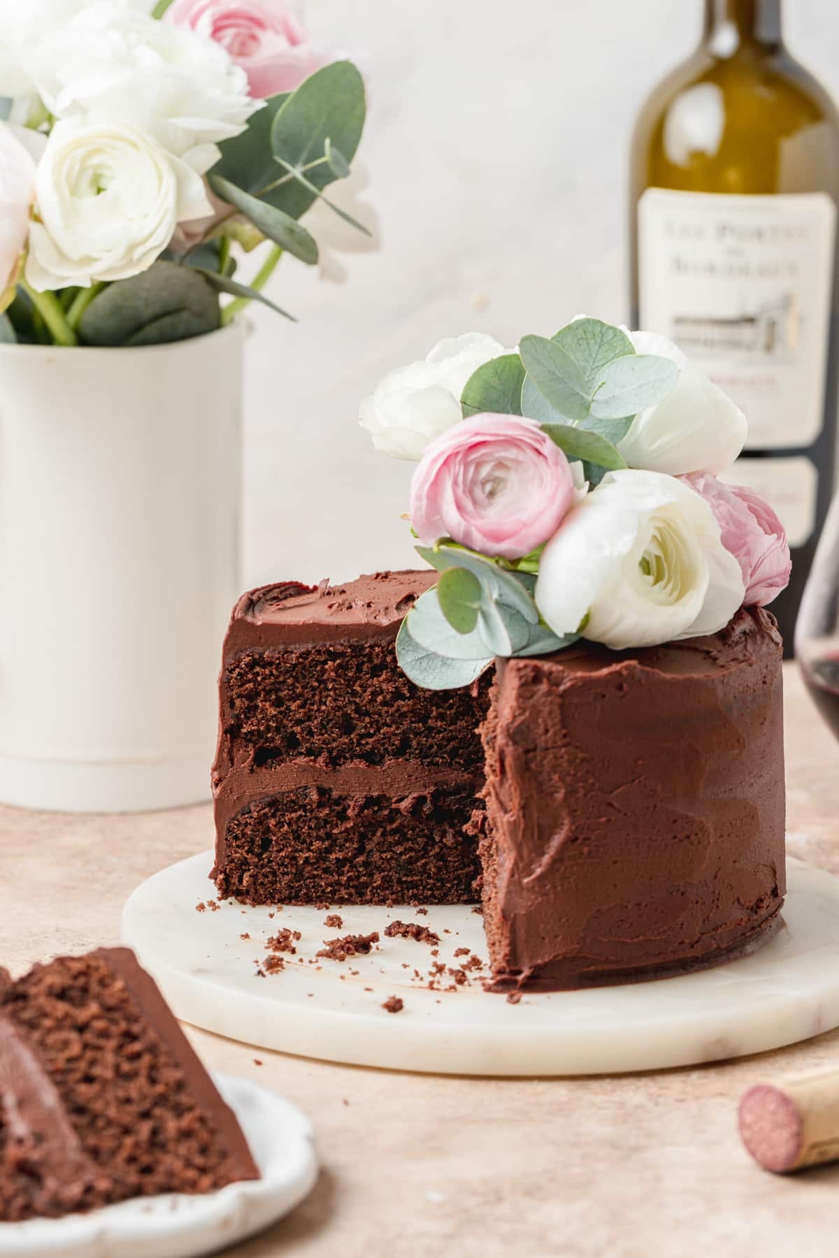 red wine chocolate cake with slice cut out so you can see the layers.