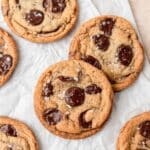 close up of brown butter chocolate chip cookies with toffee pieces.