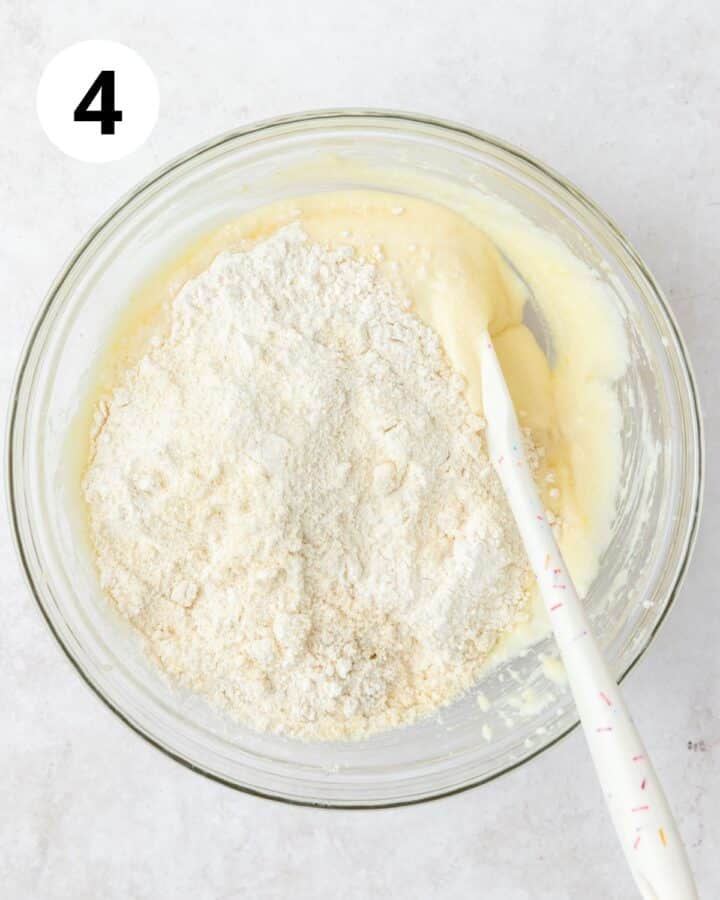 adding dry ingredients to batter.