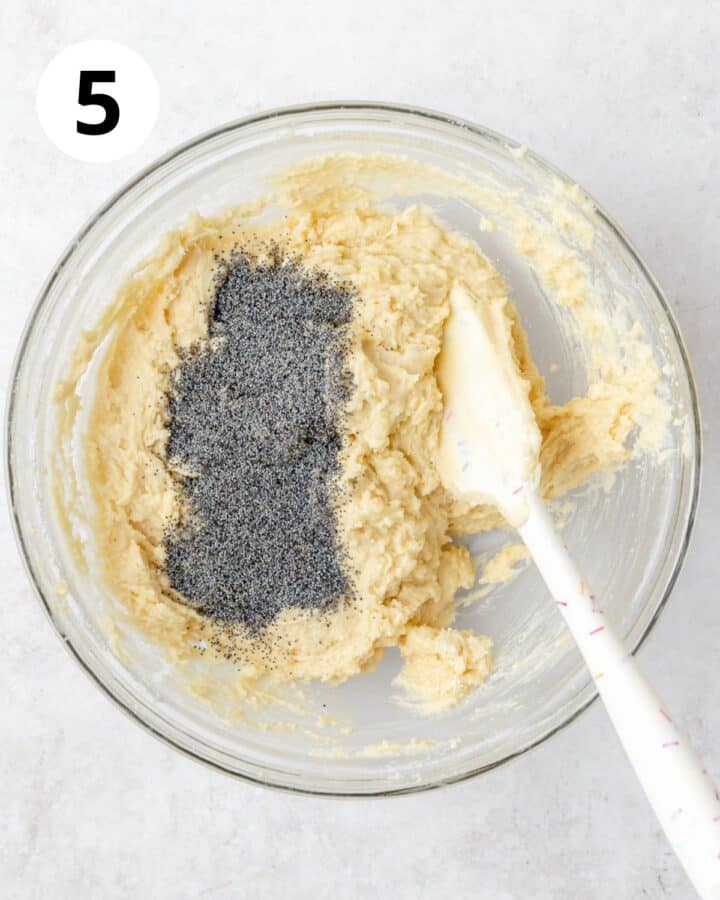 adding poppy seeds to batter.