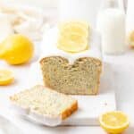 close up of lemon poppy seed loaf cake with lemon glaze.