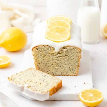 close up of lemon poppy seed loaf cake with lemon glaze.
