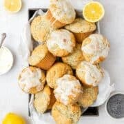 close up of lemon poppy seed muffins with lemon glaze.