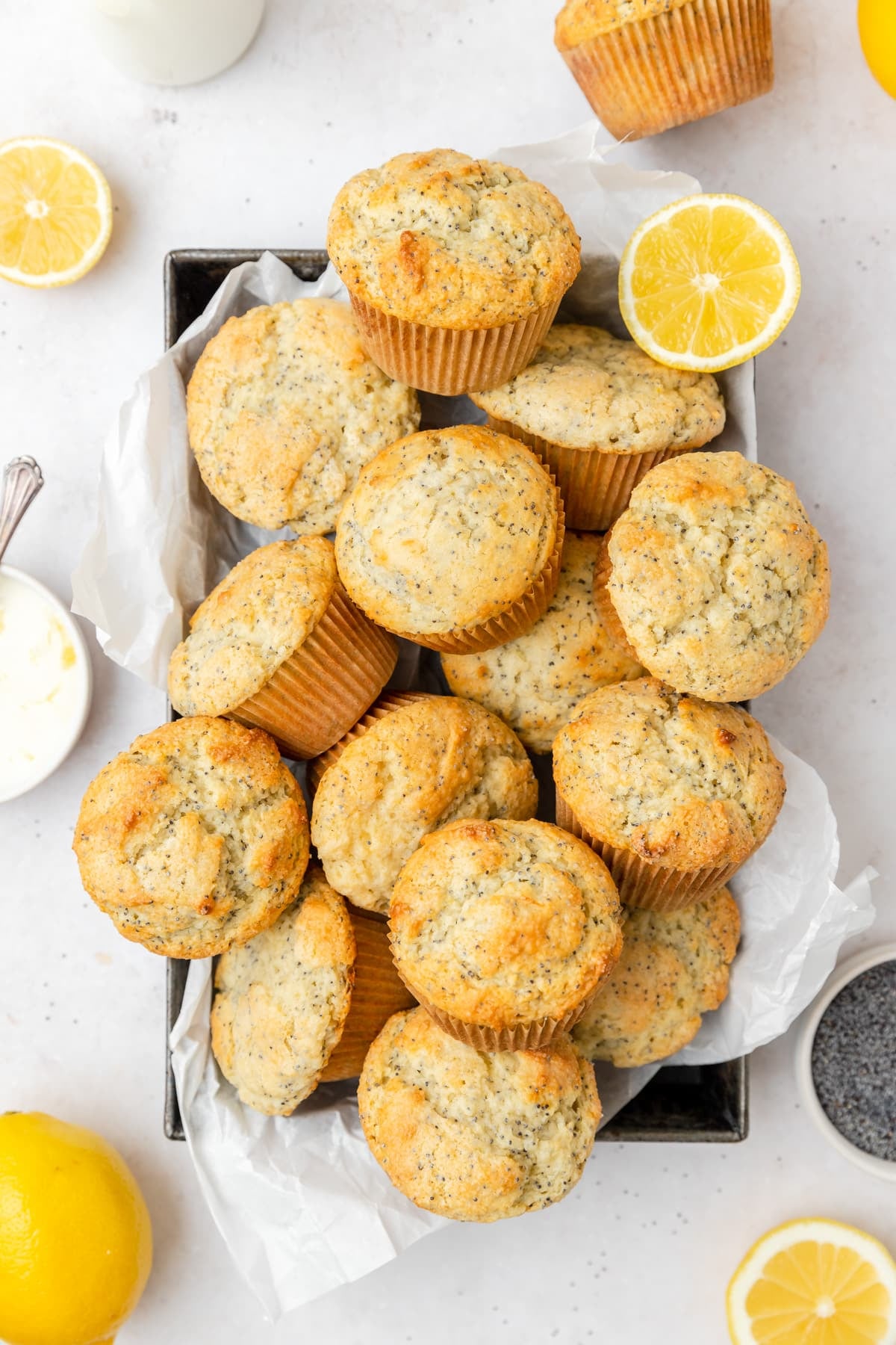 lemon poppy seed muffins in tray.