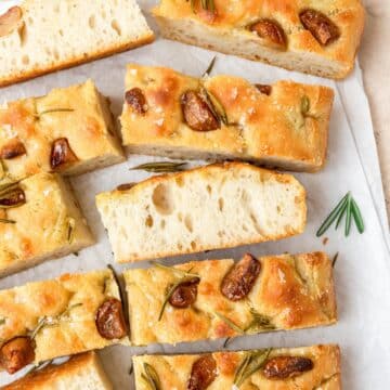 close up of sourdough focaccia with roasted garlic.