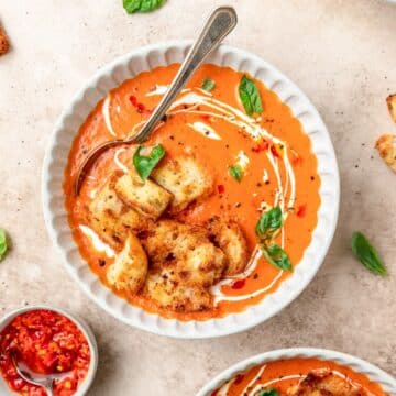 close up of bowl of spicy tomato soup with calabrian chilies.