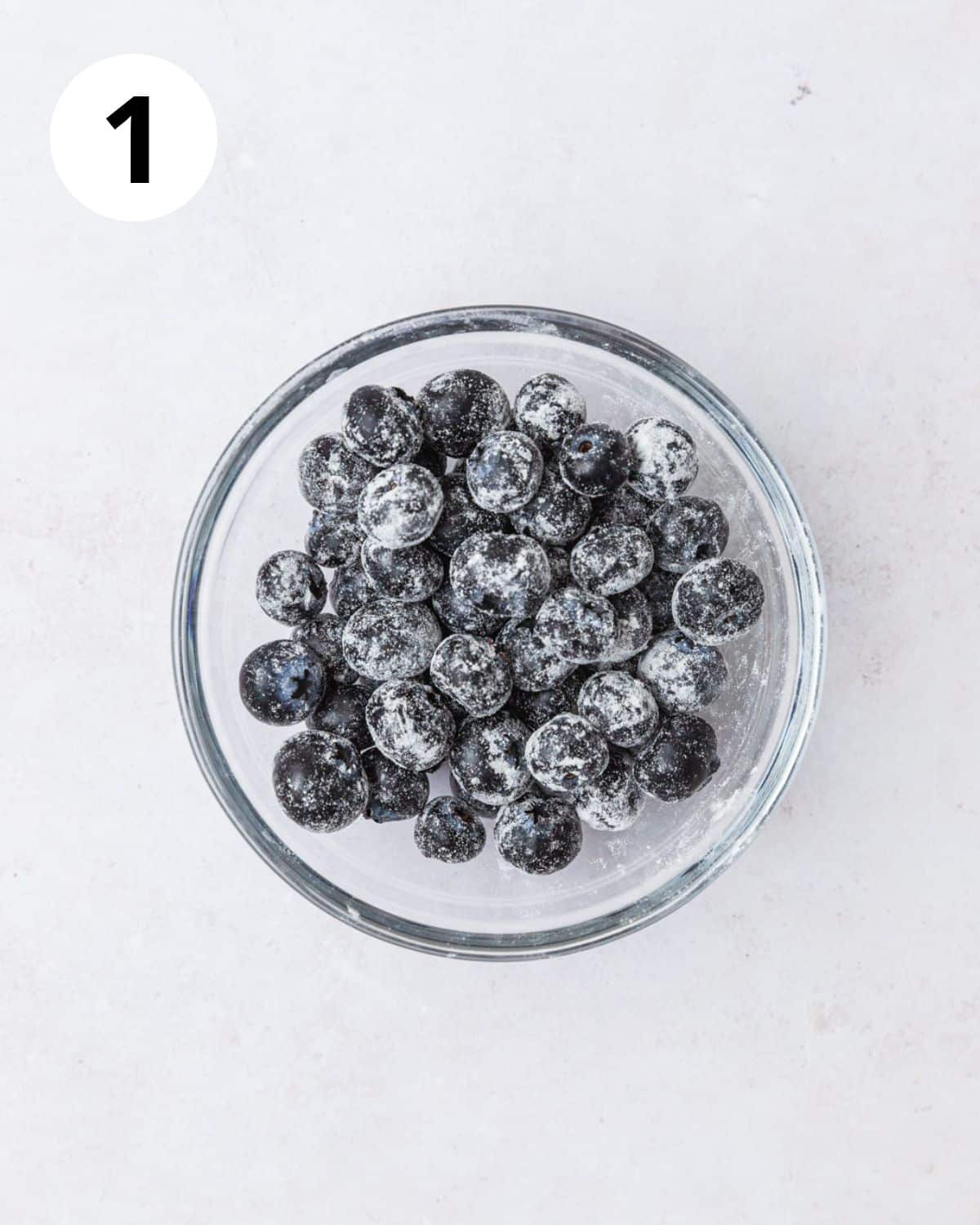 blueberries tossed in flour.