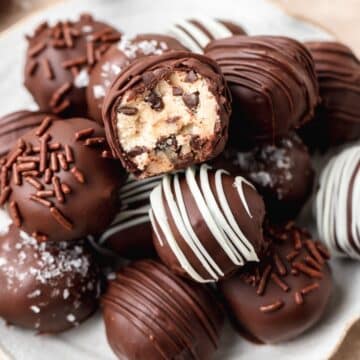 close up of chocolate covered cookie dough bites.