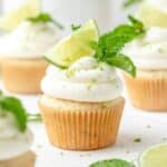 close up of mint mojito cupcakes with cream cheese frosting.
