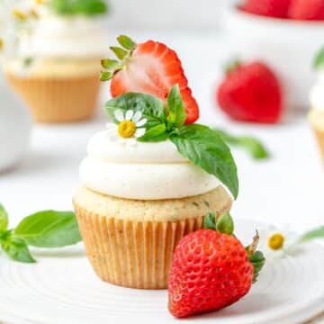 close up of strawberry basil cupcakes.