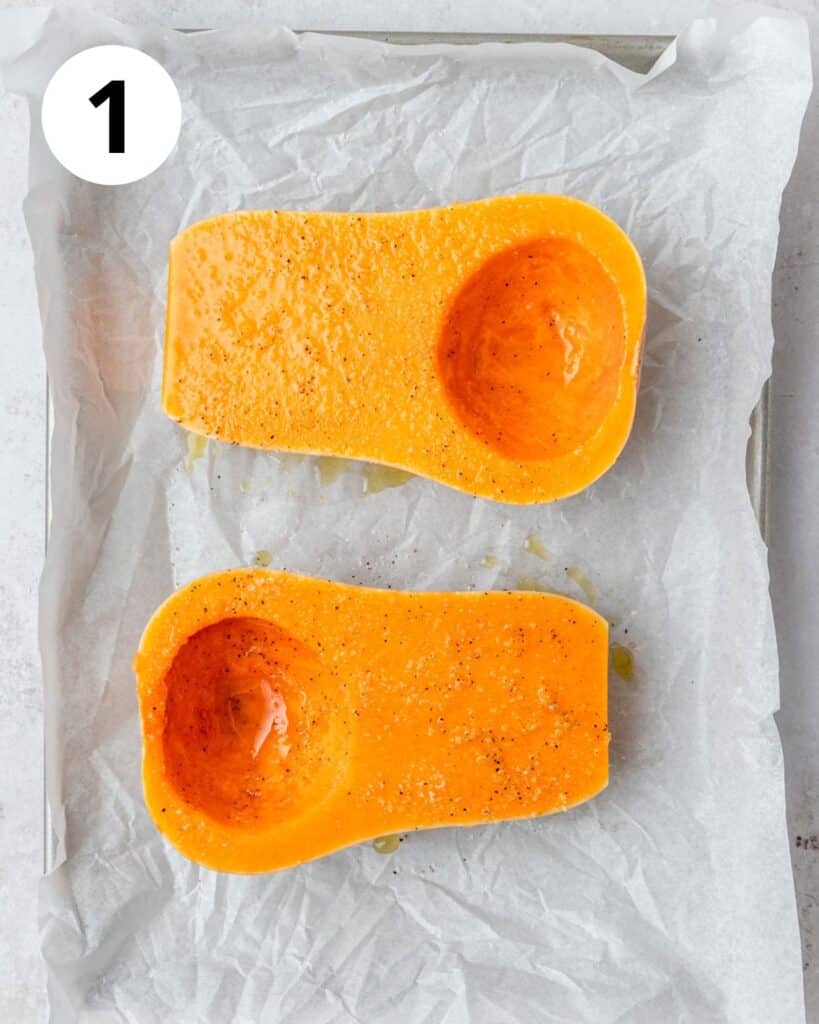 small butternut squash cut in half.