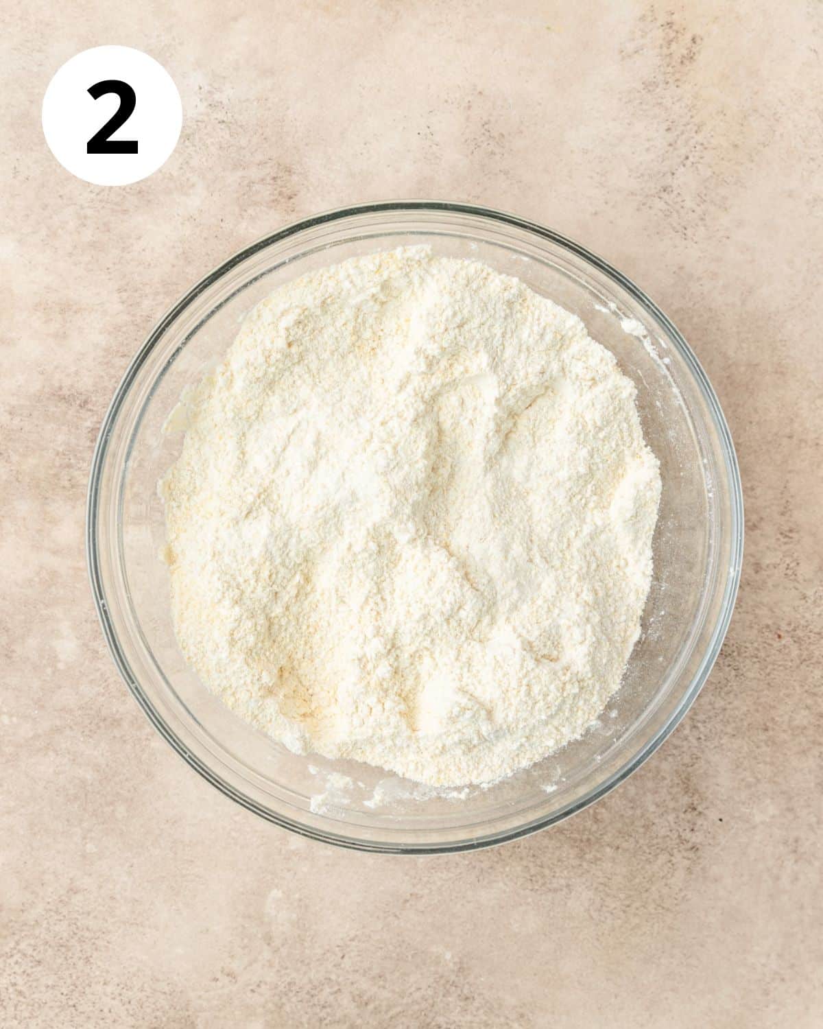 mixing together dry ingredients for cornbread.