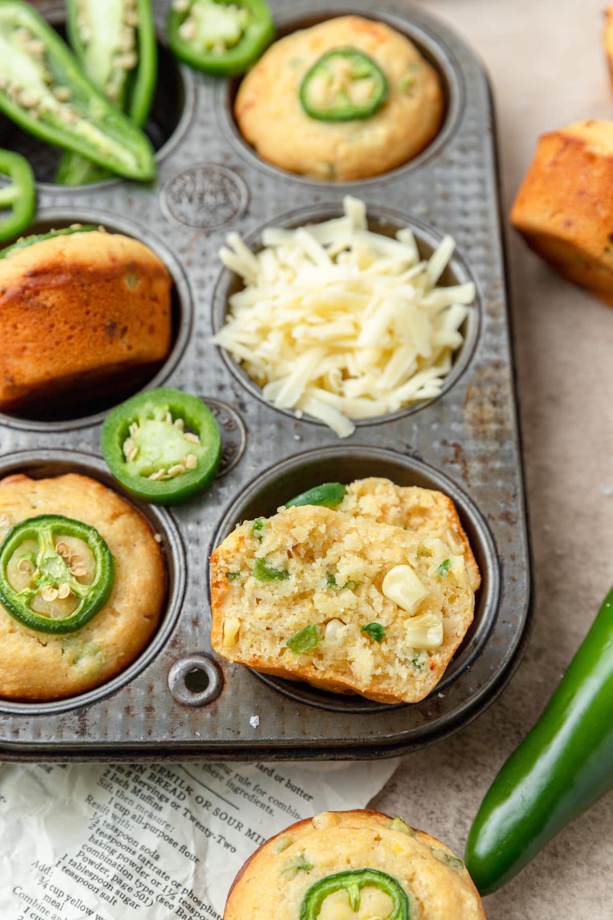 jalapeno cheddar cornbread muffin cut in half.
