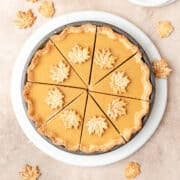 maple cream pie with maple leaf pie crust cutouts.