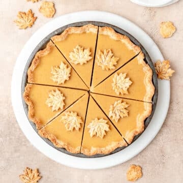 maple cream pie with maple leaf pie crust cutouts.