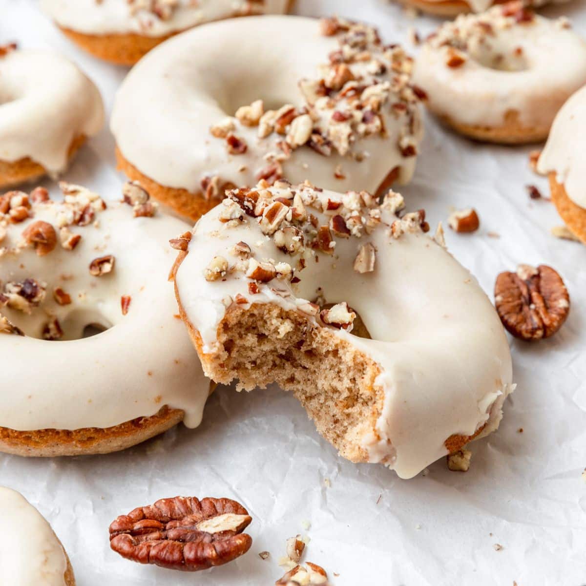 baked maple pecan donuts with maple glaze/