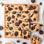 peanut butter blondies topped with dark chocolate peanut butter cups.