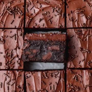 close up of frosted triple chocolate brownies.