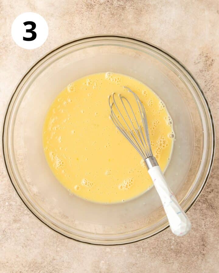 adding eggs and milk to batter.