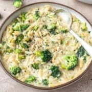 close up of creamy broccoli cheddar orzo.