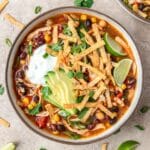 close up of slow cooker chicken tortilla soup.
