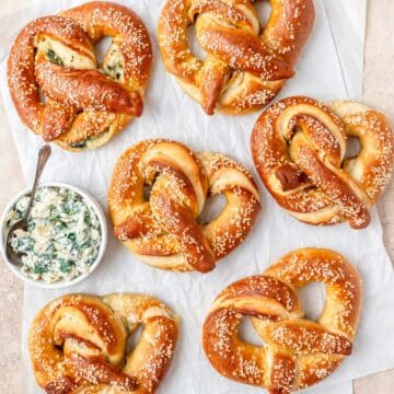 close up of spinach artichoke dip stuffed pretzels.
