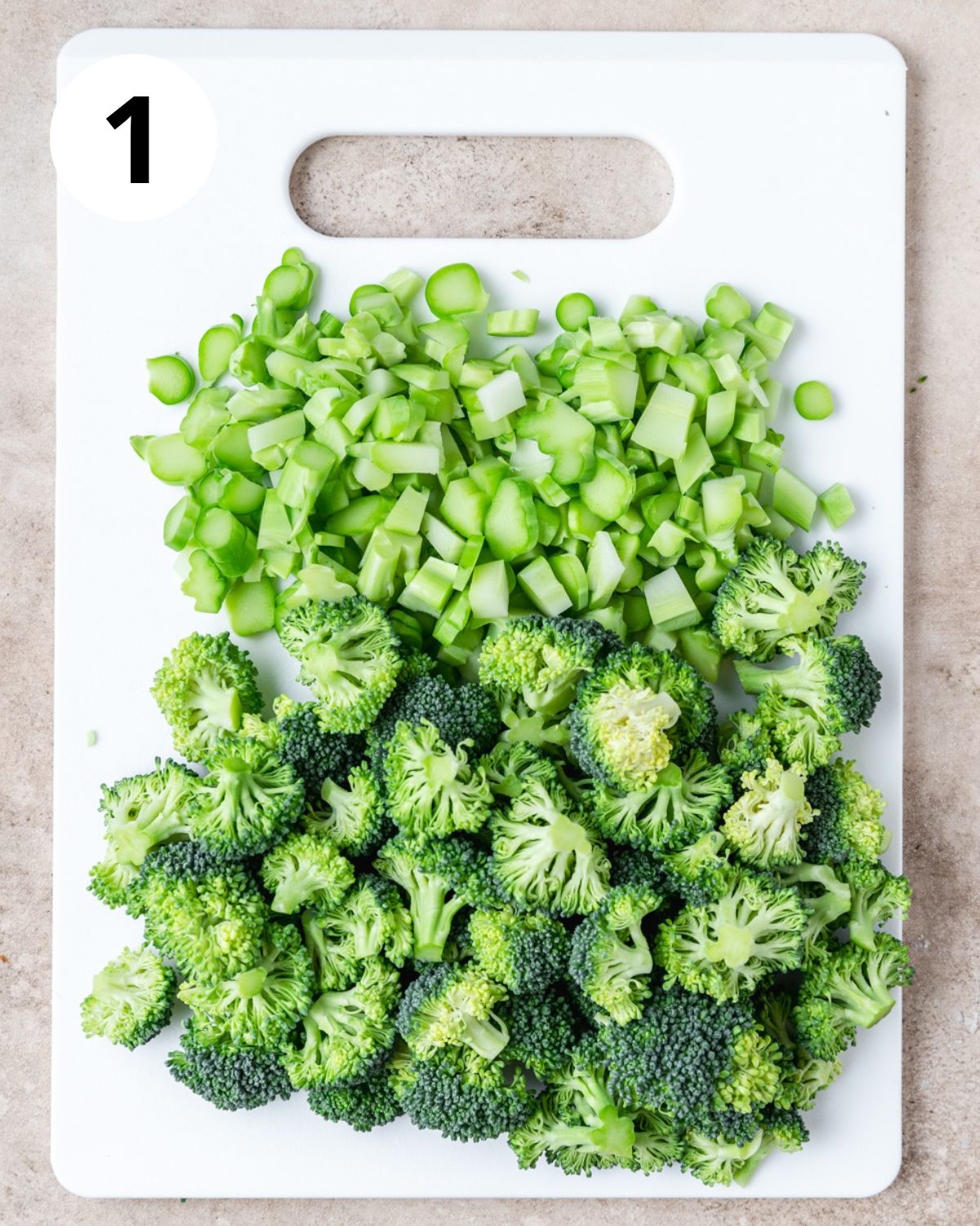 separating broccoli stems and florets.