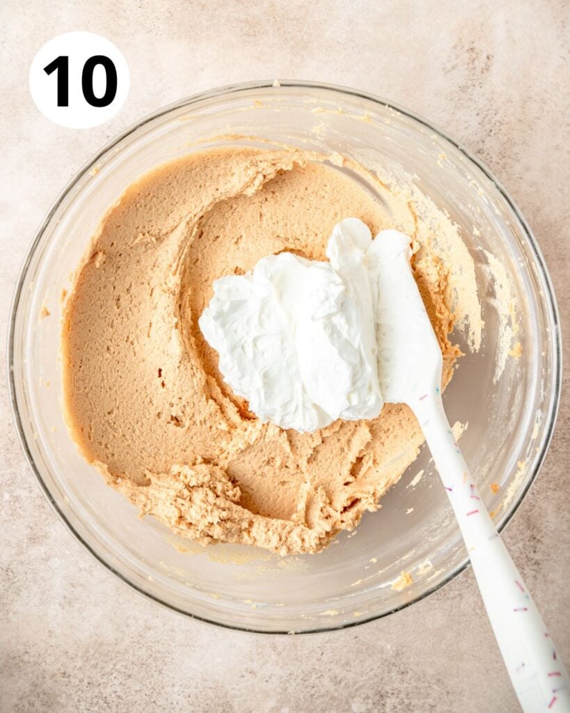 adding whipped cream to peanut butter mixture.