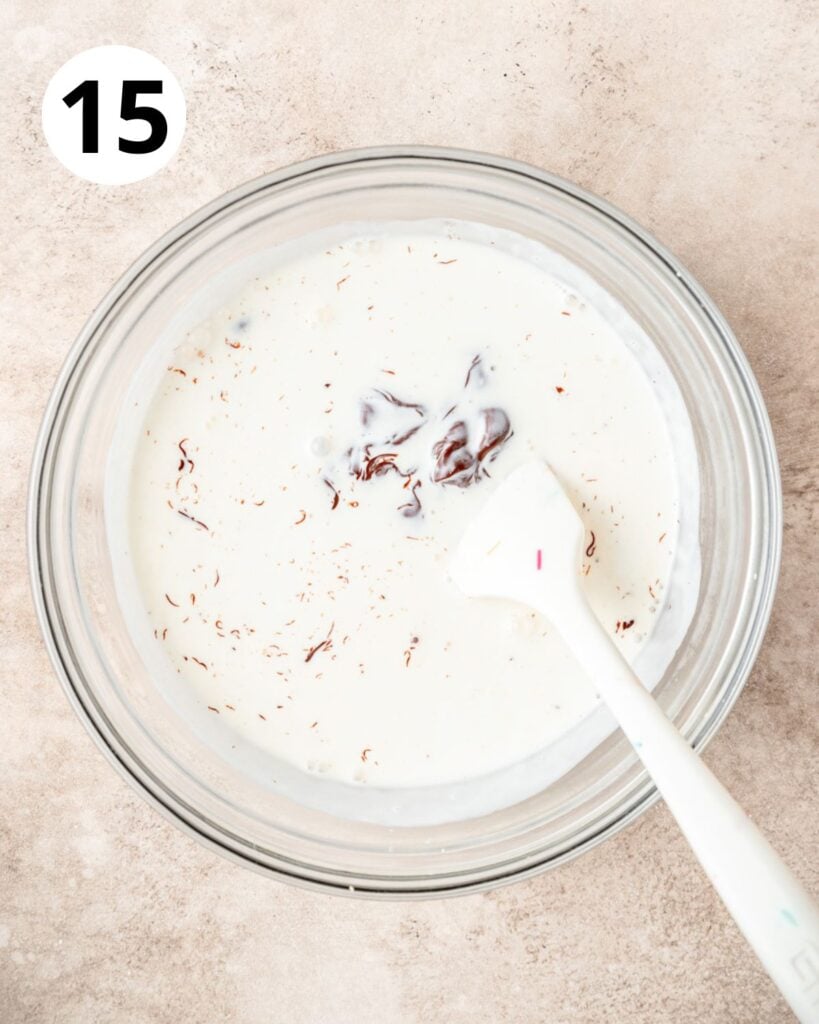 adding heavy cream to chocolate.
