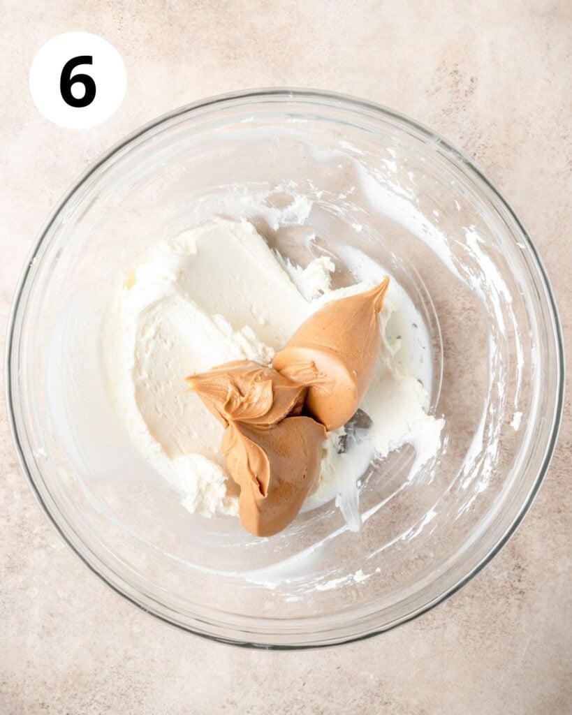 adding peanut butter to cream cheese.