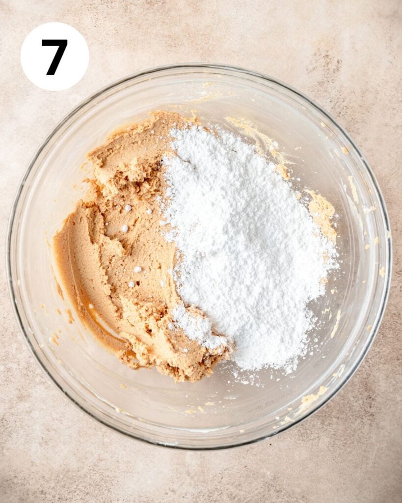 adding powdered sugar to mixture.