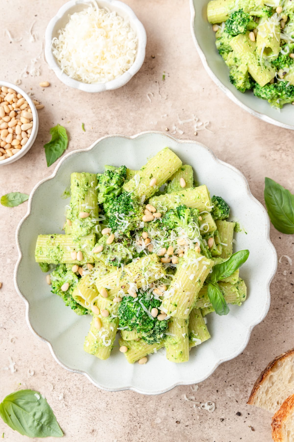creamy broccoli pasta with pesto and pine nuts.