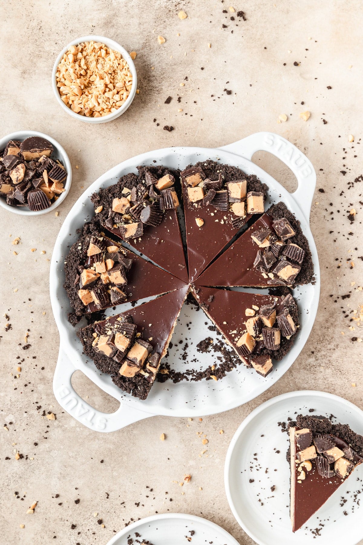 chocolate peanut butter pie cut into slices.