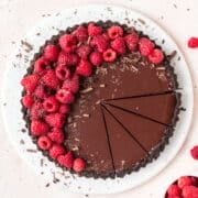 dark chocolate raspberry tart with oreo crust.