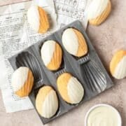 close up of white chocolate madeleines.