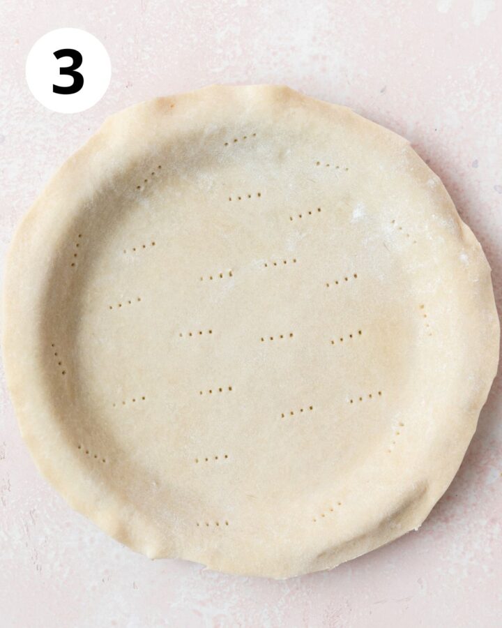 homemade pie crust rolled out in bottom of pie pan.