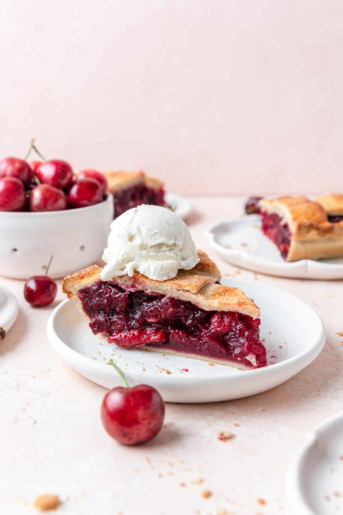 slice of cherry pie with ice cream.