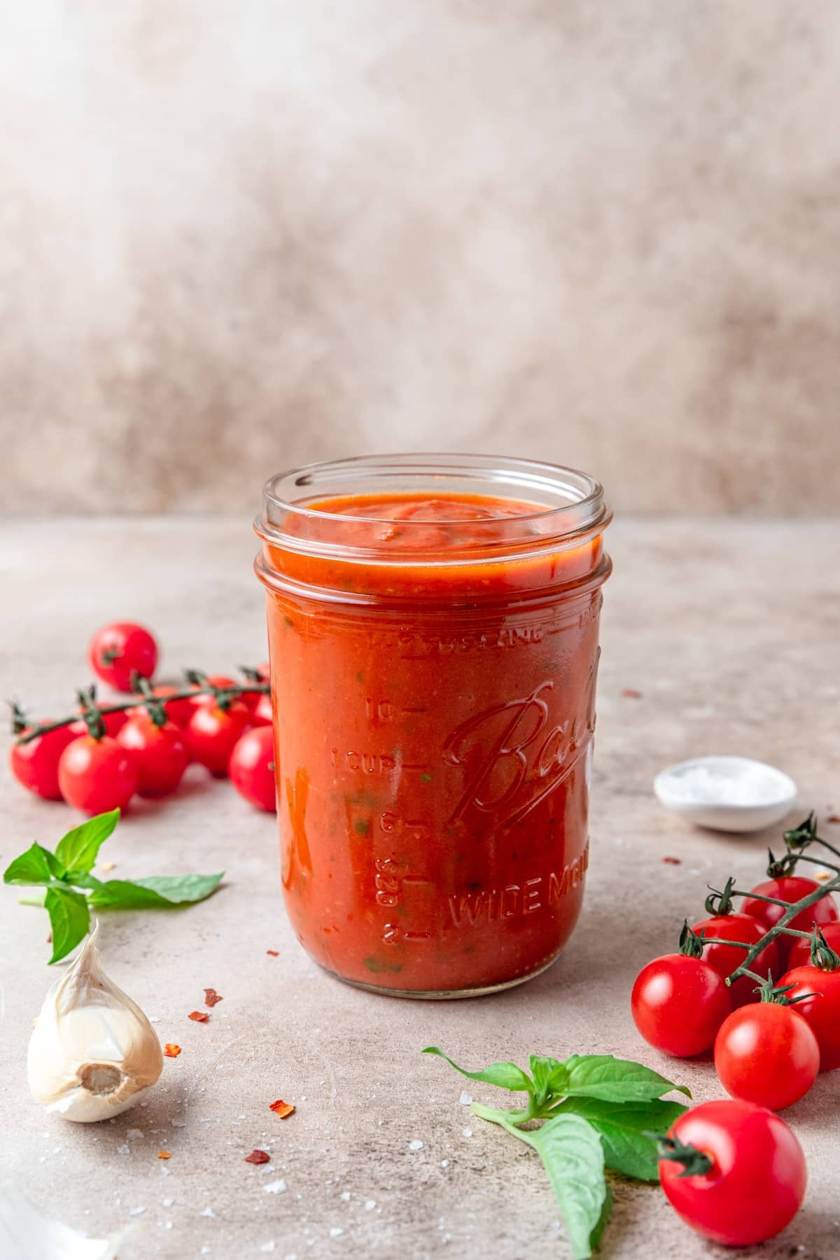 homemade san Marzano pizza sauce in jar.